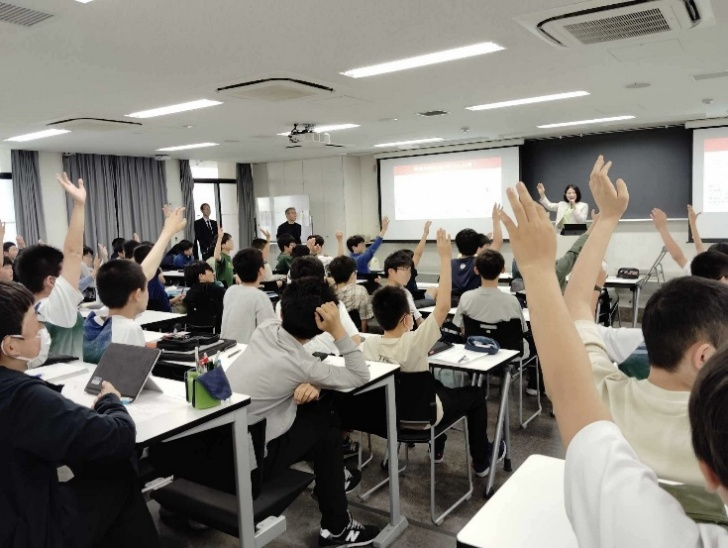 灘中学校との共創プログラムにおける金融探究学習を実施 - お知らせ