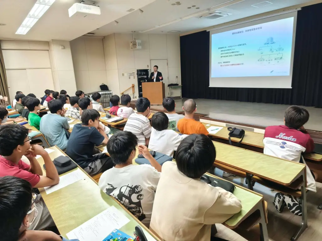 灘中学校にて「納める」をテーマにした金融教育出前授業を実施